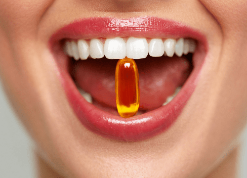 Supplements in a woman's mouth